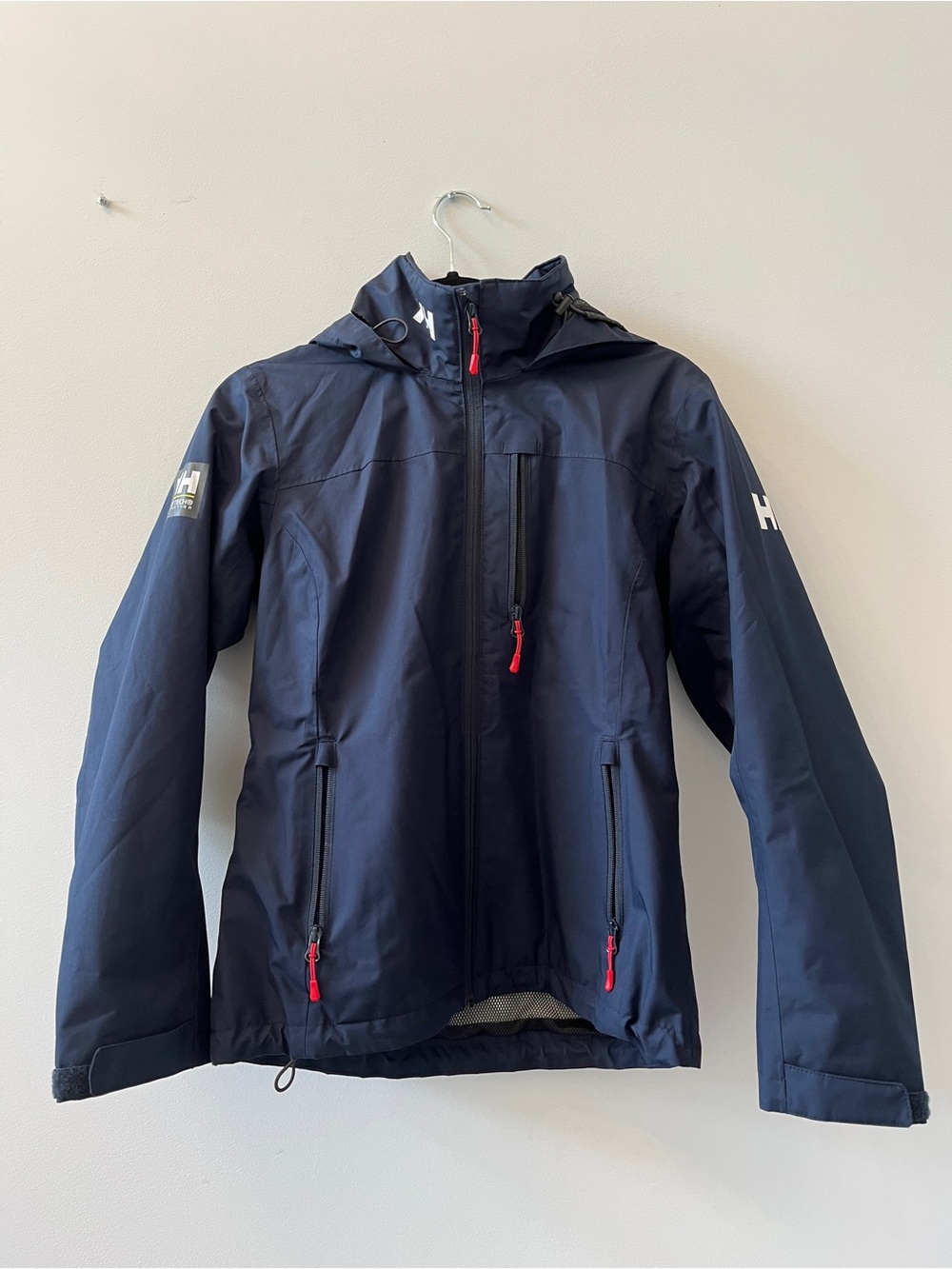 Helly Hansen Navy Hooded Ski Jacket with Red Zipper Pulls